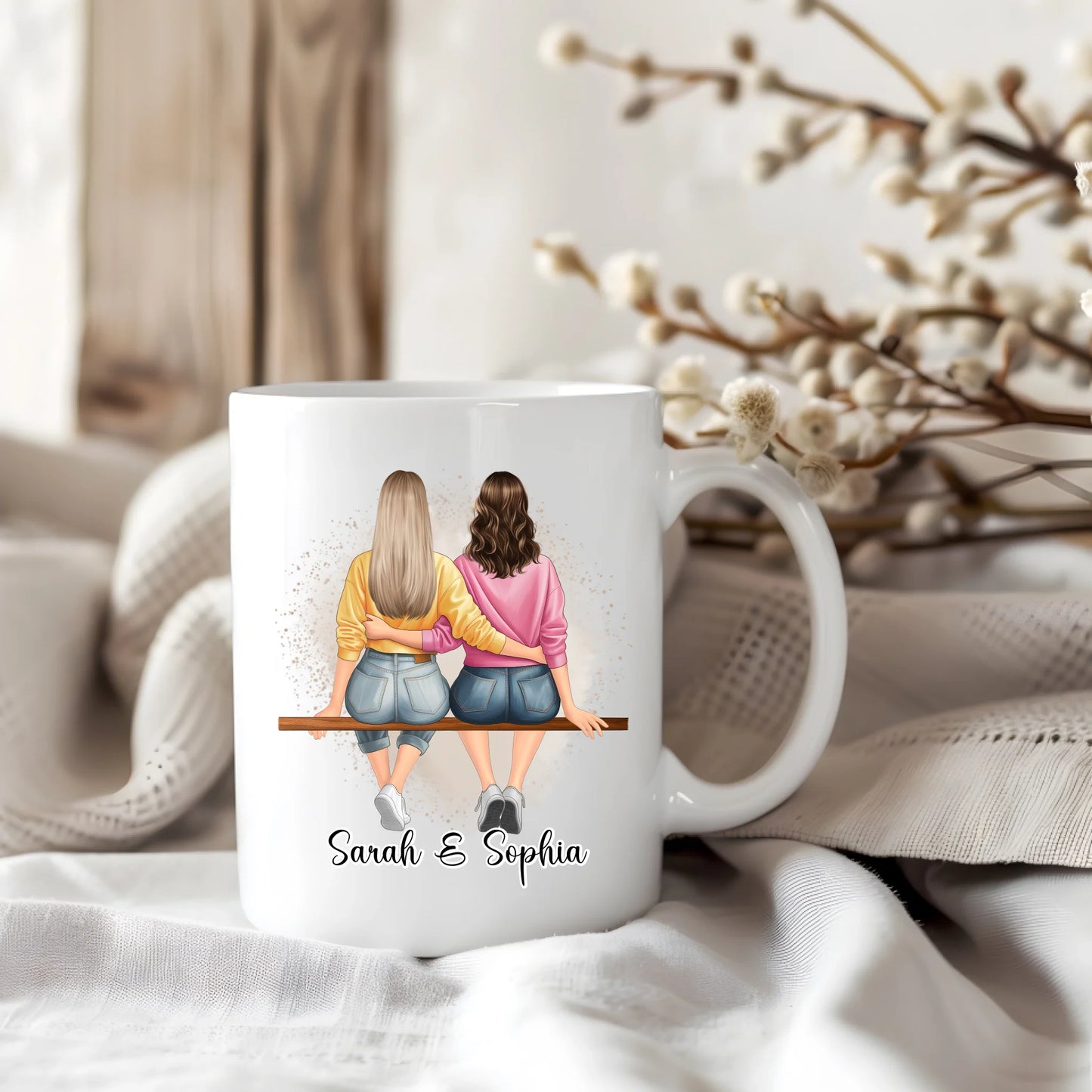 Freundinnen sitzend Tasse