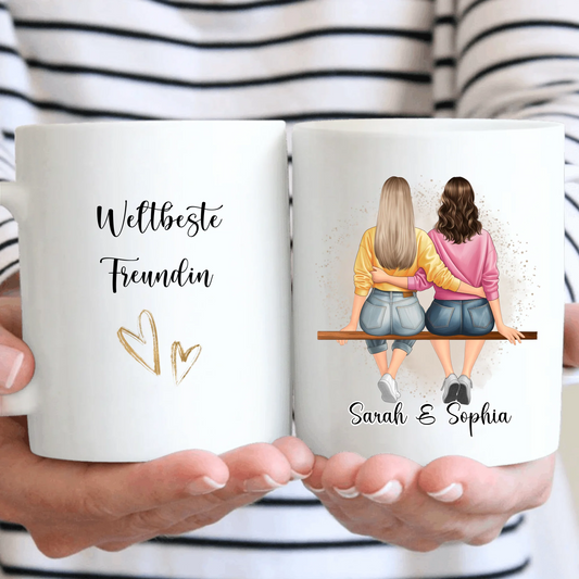 Freundinnen sitzend Tasse