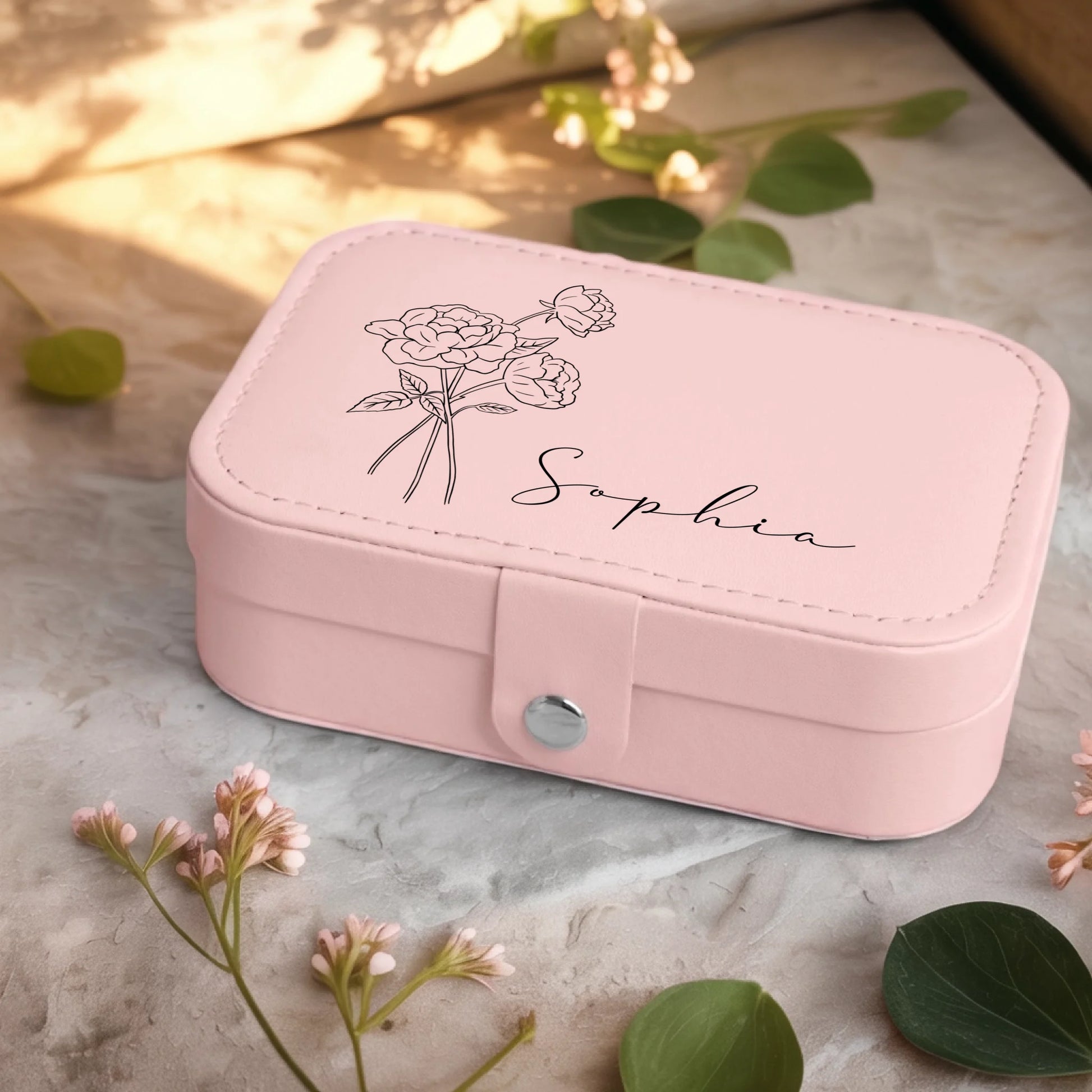 0001_2_a-jewelry-box-sits-on-a-neutral-stone-su_Ydk2BB8sQwiM8A0Y7cbmDg_EAF00DjQSb6ezGyMQnx5aA