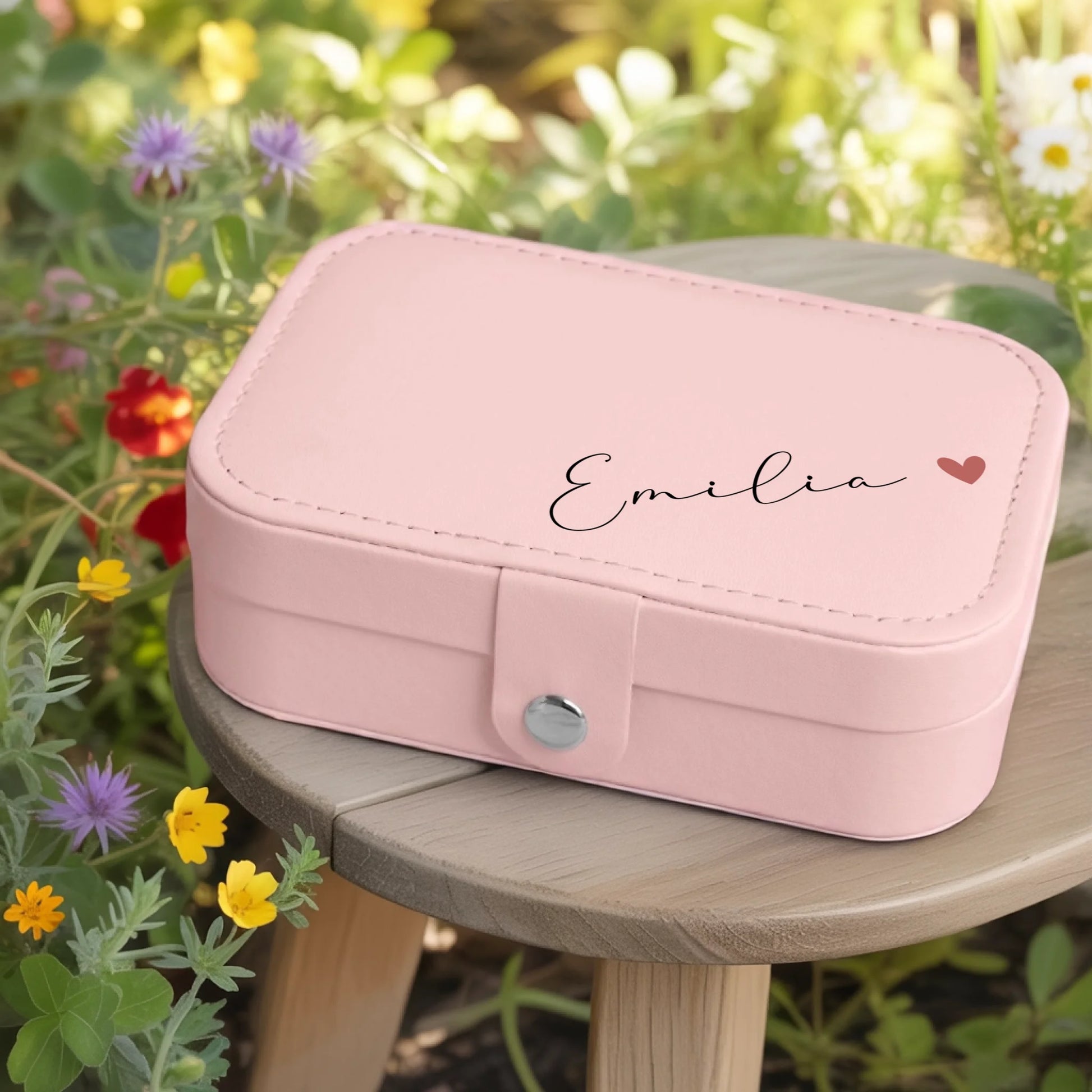 0002_1_a-jewelry-box-rests-on-a-wooden-table-in_jtTehCEgQoesk_XW48583Q_8bqHNi4kT0Oo3bStArII8A