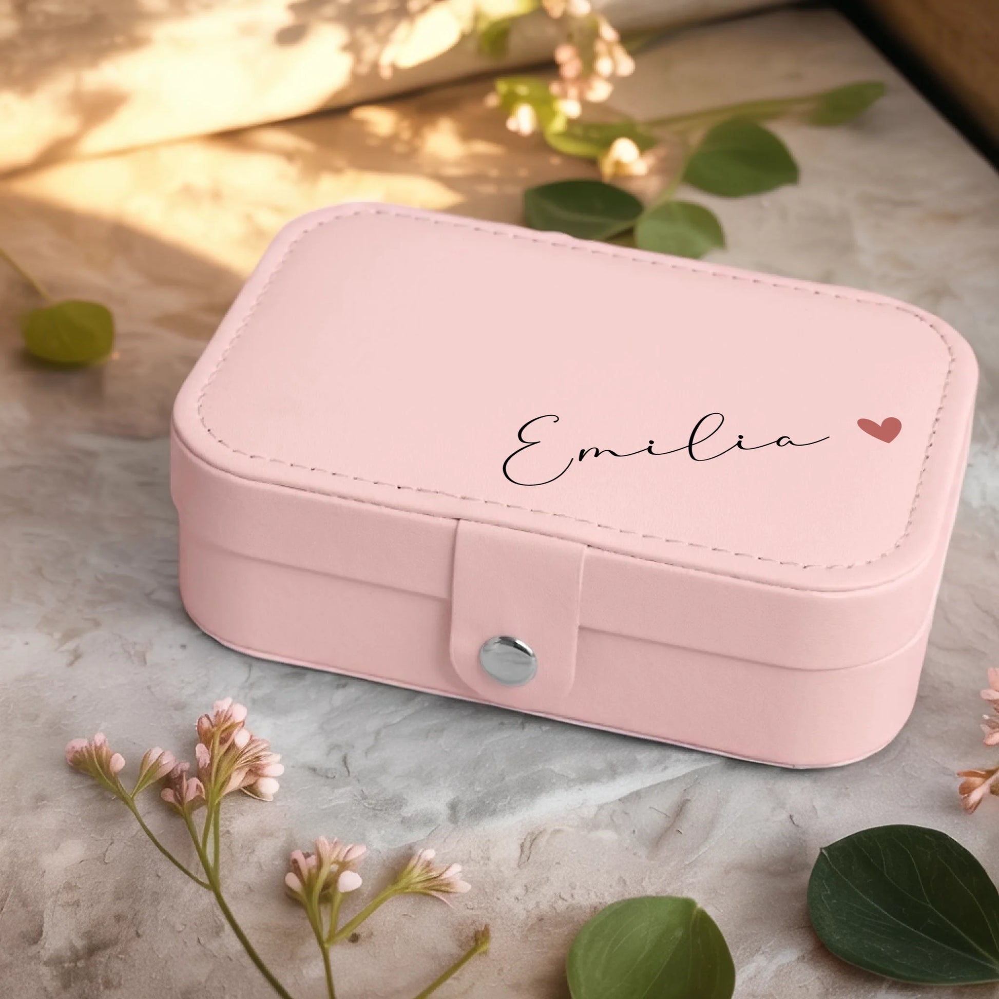 0001_2_a-jewelry-box-sits-on-a-neutral-stone-su_Ydk2BB8sQwiM8A0Y7cbmDg_EAF00DjQSb6ezGyMQnx5aA