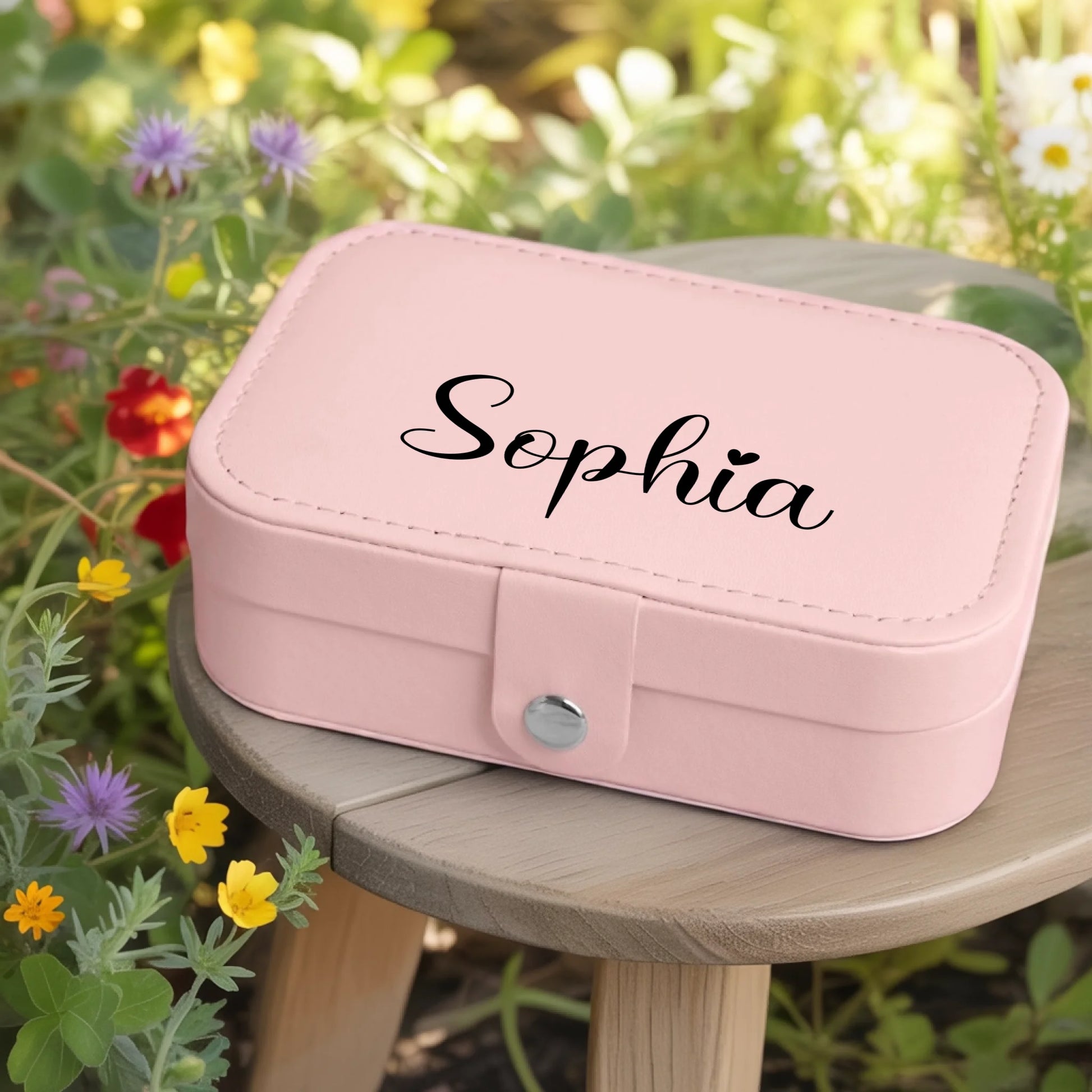 0002_1_a-jewelry-box-rests-on-a-wooden-table-in_jtTehCEgQoesk_XW48583Q_8bqHNi4kT0Oo3bStArII8A