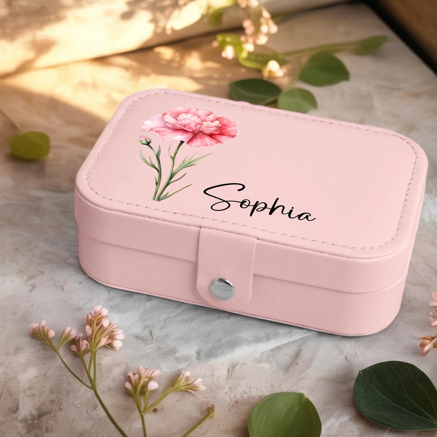 0001_2_a-jewelry-box-sits-on-a-neutral-stone-su_Ydk2BB8sQwiM8A0Y7cbmDg_EAF00DjQSb6ezGyMQnx5aA