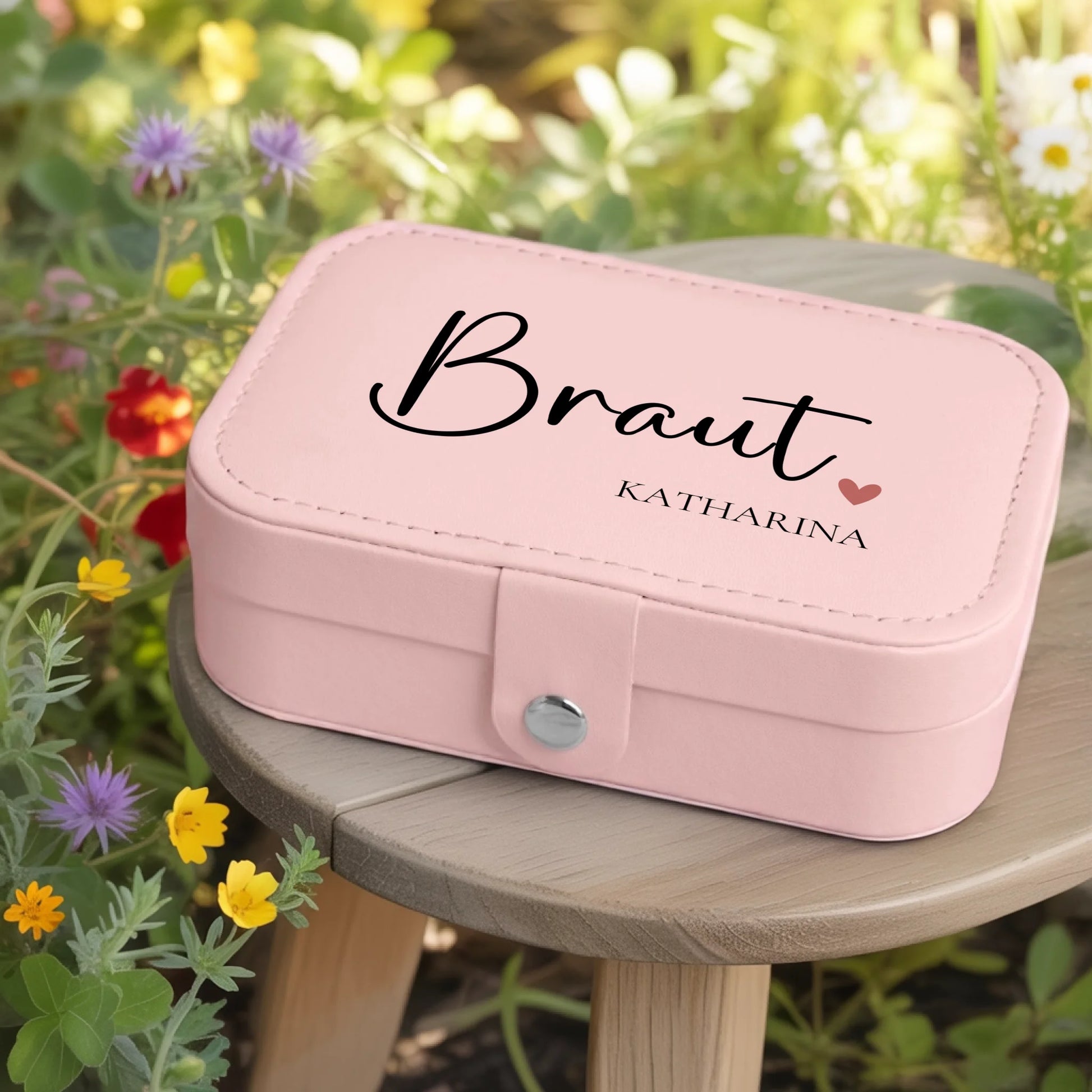 0002_1_a-jewelry-box-rests-on-a-wooden-table-in_jtTehCEgQoesk_XW48583Q_8bqHNi4kT0Oo3bStArII8A