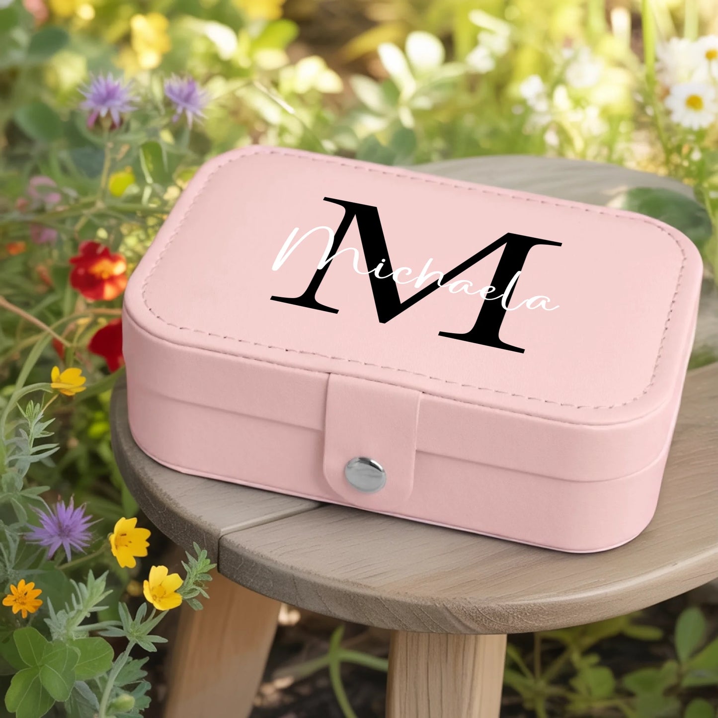 0002_1_a-jewelry-box-rests-on-a-wooden-table-in_jtTehCEgQoesk_XW48583Q_8bqHNi4kT0Oo3bStArII8A