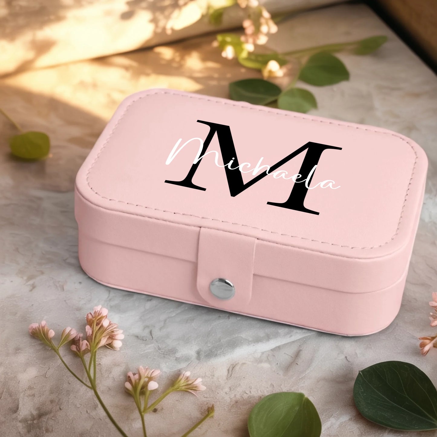 0001_2_a-jewelry-box-sits-on-a-neutral-stone-su_Ydk2BB8sQwiM8A0Y7cbmDg_EAF00DjQSb6ezGyMQnx5aA