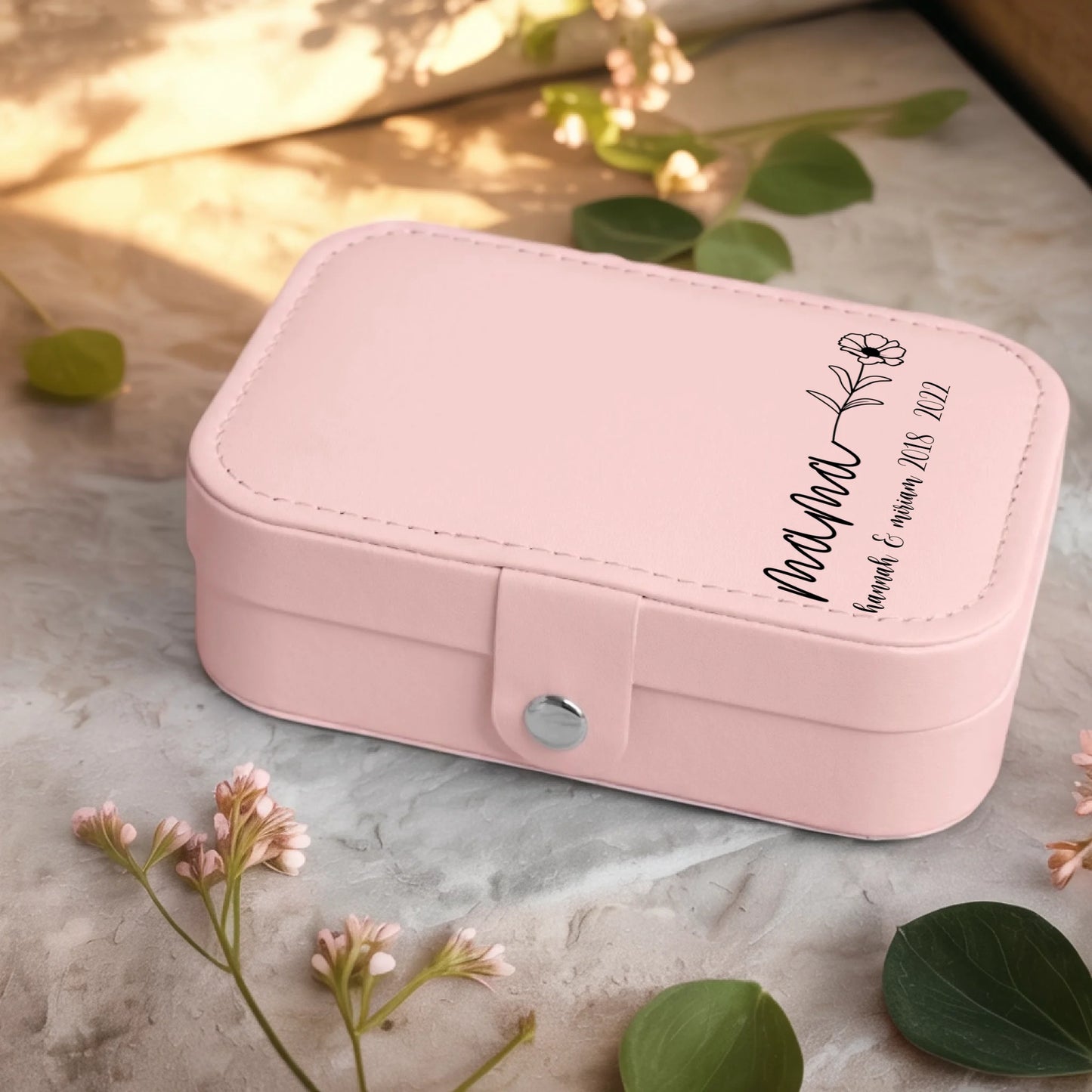 0001_2_a-jewelry-box-sits-on-a-neutral-stone-su_Ydk2BB8sQwiM8A0Y7cbmDg_EAF00DjQSb6ezGyMQnx5aA