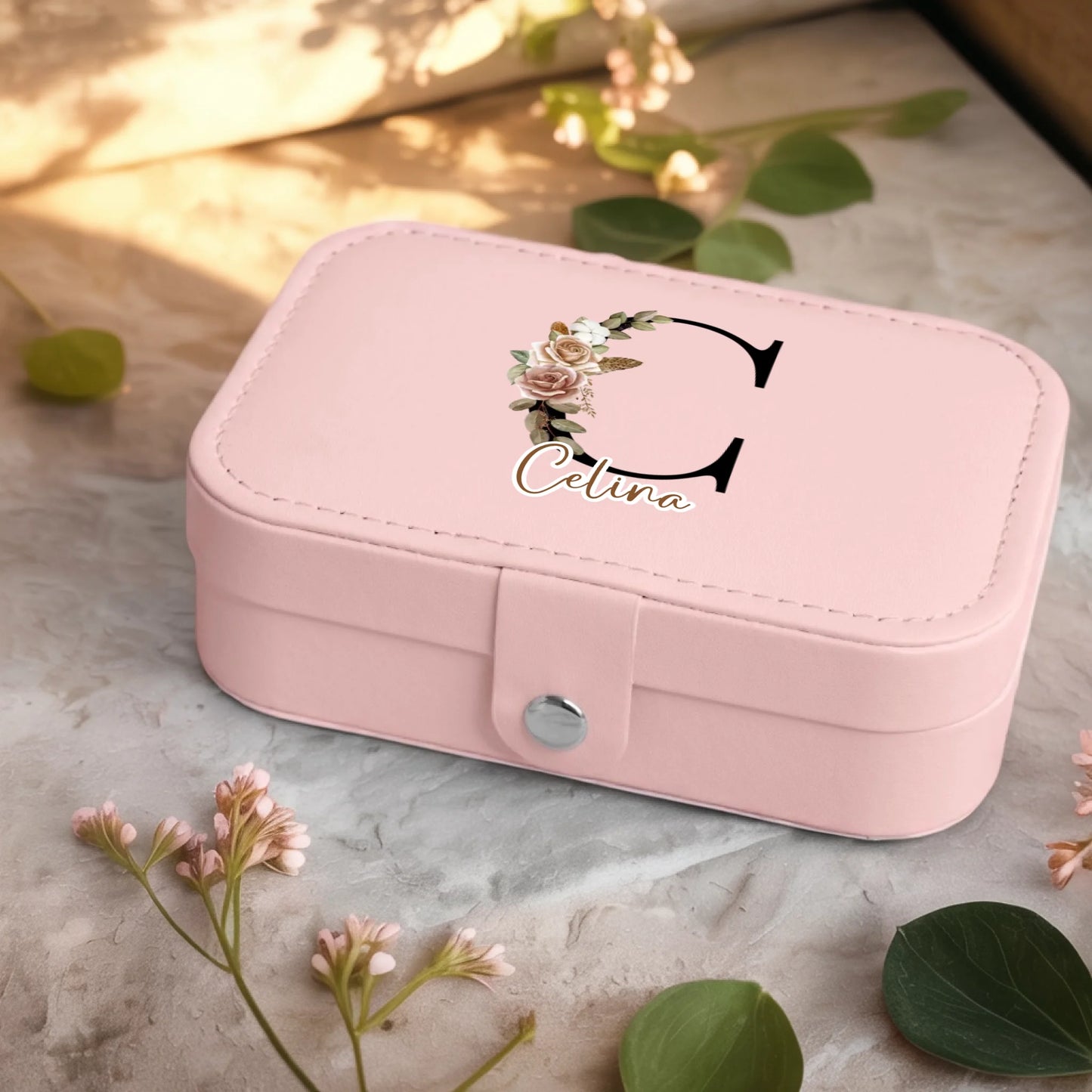 0001_2_a-jewelry-box-sits-on-a-neutral-stone-su_Ydk2BB8sQwiM8A0Y7cbmDg_EAF00DjQSb6ezGyMQnx5aA