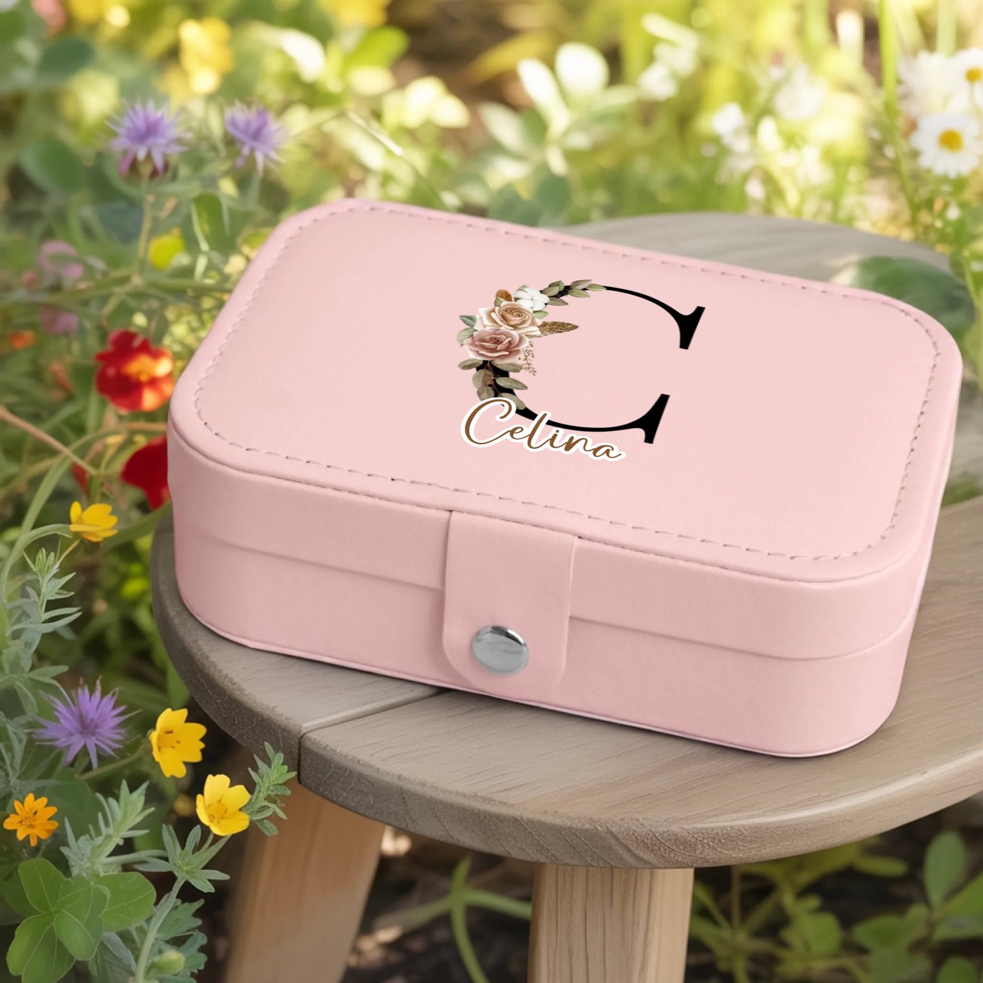 0002_1_a-jewelry-box-rests-on-a-wooden-table-in_jtTehCEgQoesk_XW48583Q_8bqHNi4kT0Oo3bStArII8A