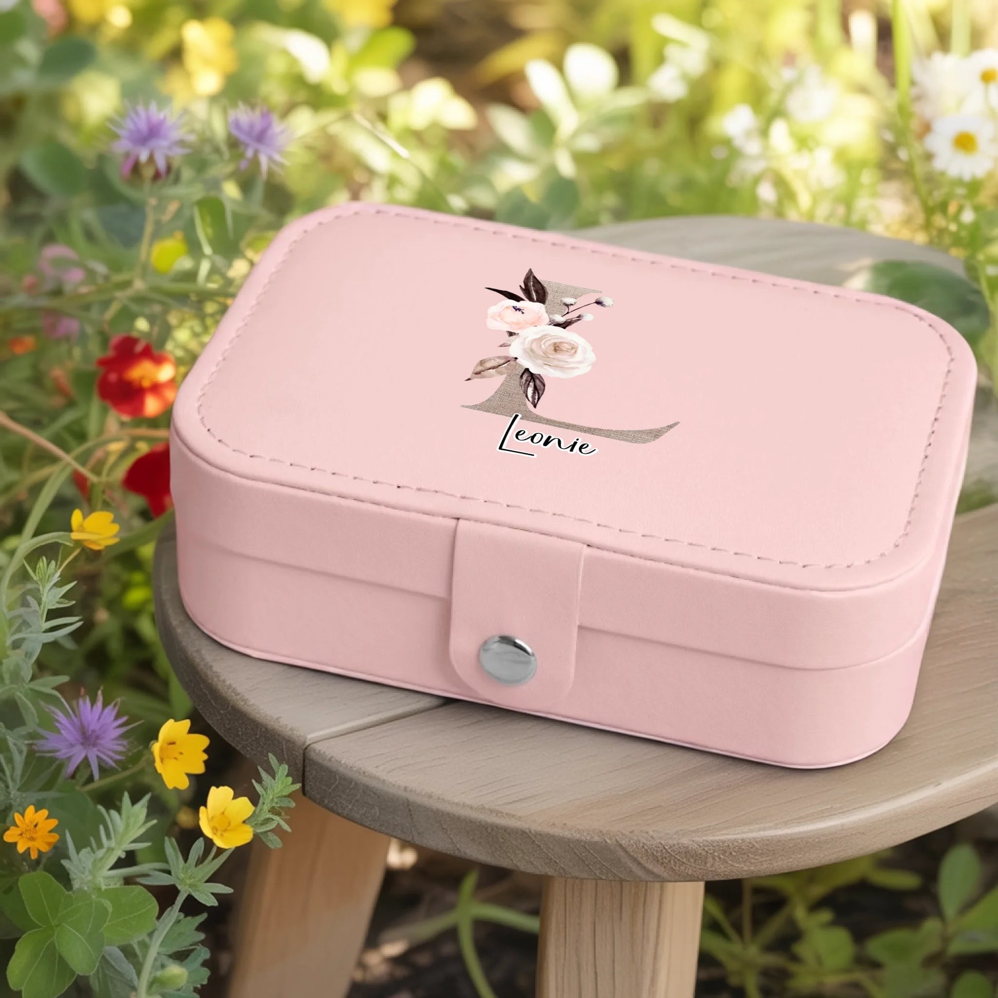 0002_1_a-jewelry-box-rests-on-a-wooden-table-in_jtTehCEgQoesk_XW48583Q_8bqHNi4kT0Oo3bStArII8A