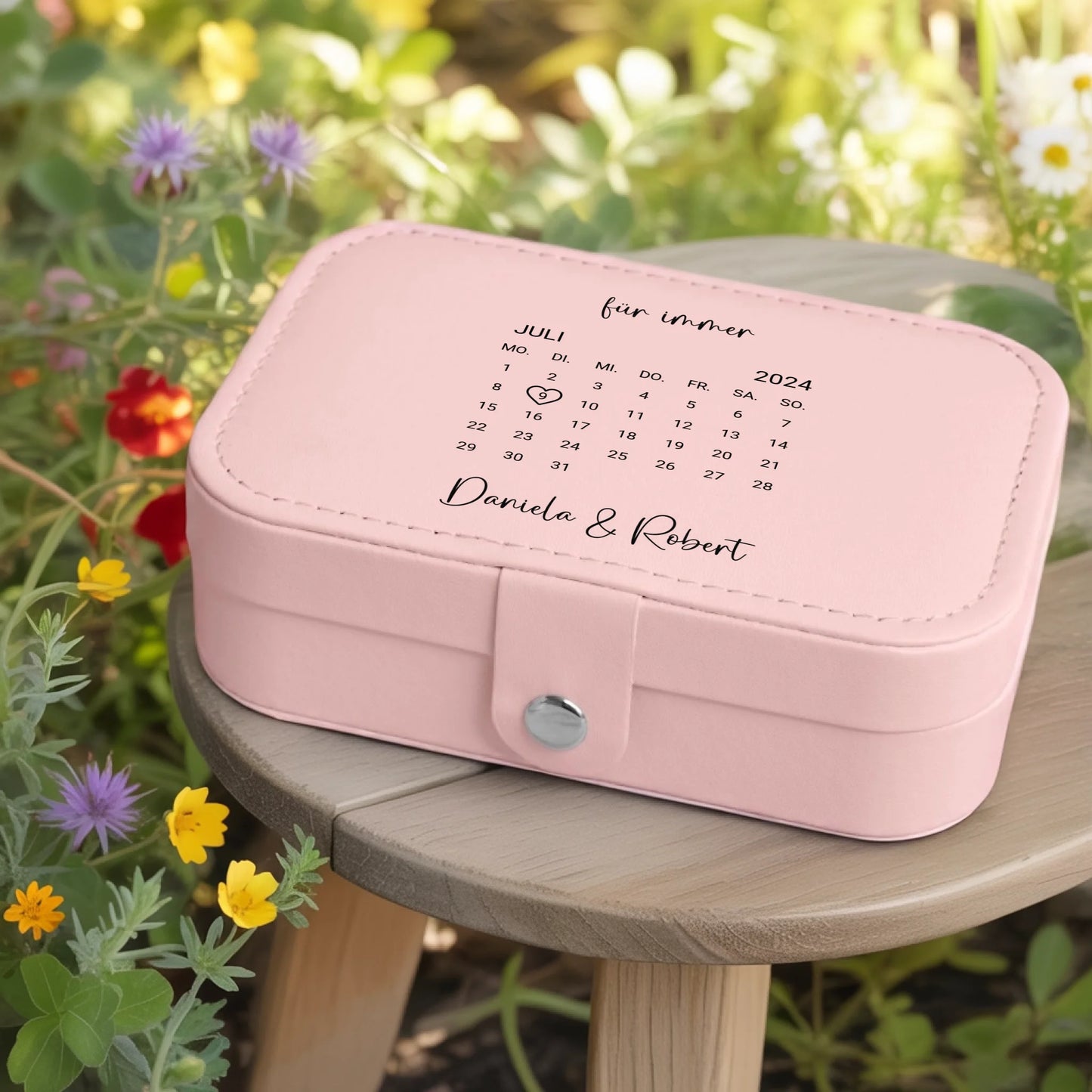 0002_1_a-jewelry-box-rests-on-a-wooden-table-in_jtTehCEgQoesk_XW48583Q_8bqHNi4kT0Oo3bStArII8A