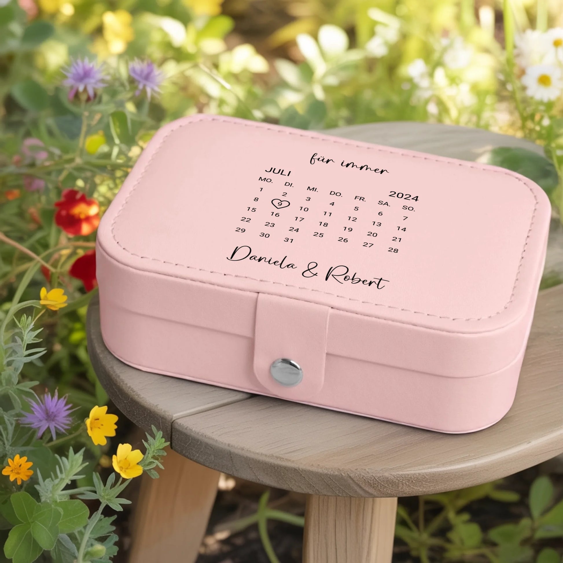 0002_1_a-jewelry-box-rests-on-a-wooden-table-in_jtTehCEgQoesk_XW48583Q_8bqHNi4kT0Oo3bStArII8A