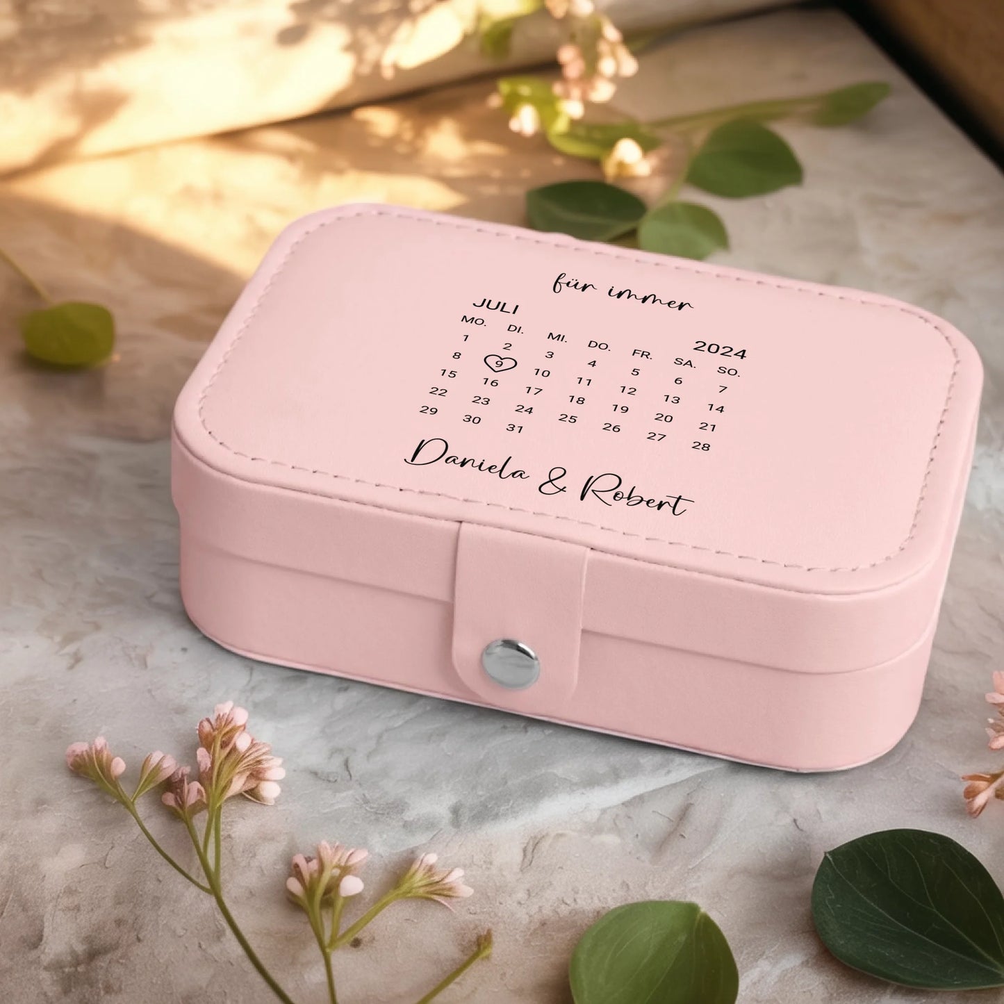 0001_2_a-jewelry-box-sits-on-a-neutral-stone-su_Ydk2BB8sQwiM8A0Y7cbmDg_EAF00DjQSb6ezGyMQnx5aA