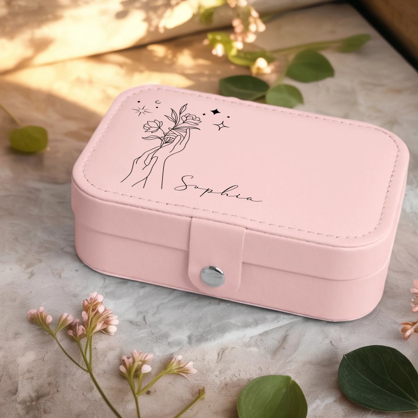 0001_2_a-jewelry-box-sits-on-a-neutral-stone-su_Ydk2BB8sQwiM8A0Y7cbmDg_EAF00DjQSb6ezGyMQnx5aA