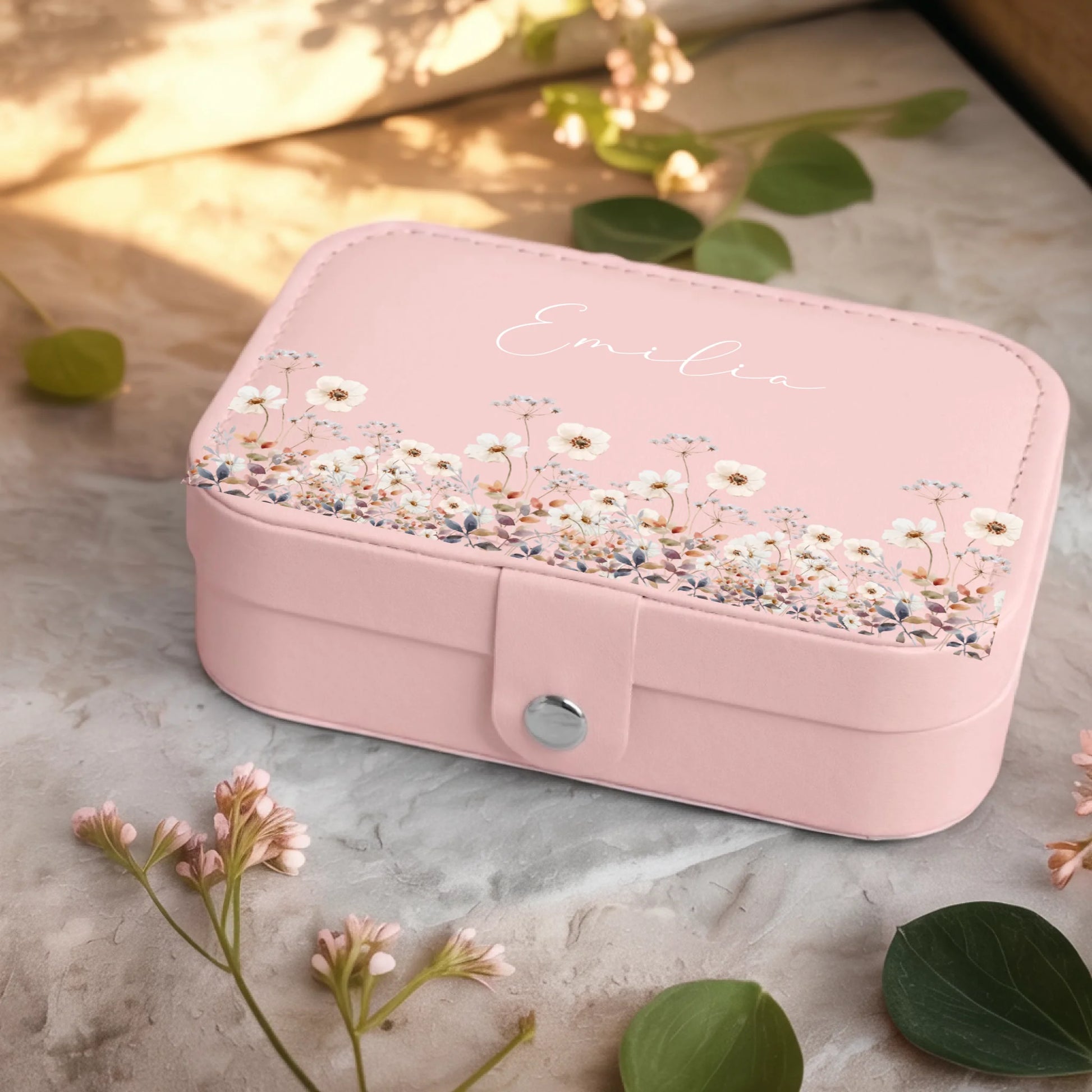 0001_2_a-jewelry-box-sits-on-a-neutral-stone-su_Ydk2BB8sQwiM8A0Y7cbmDg_EAF00DjQSb6ezGyMQnx5aA
